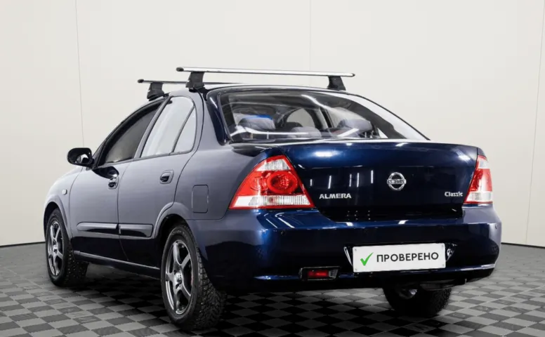 Nissan Almera Classic I 1.6 AT (107 л.с.)