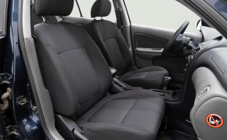 Nissan Almera Classic I 1.6 AT (107 л.с.)