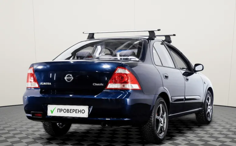Nissan Almera Classic I 1.6 AT (107 л.с.)
