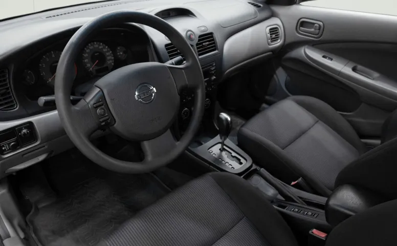 Nissan Almera Classic I 1.6 AT (107 л.с.)