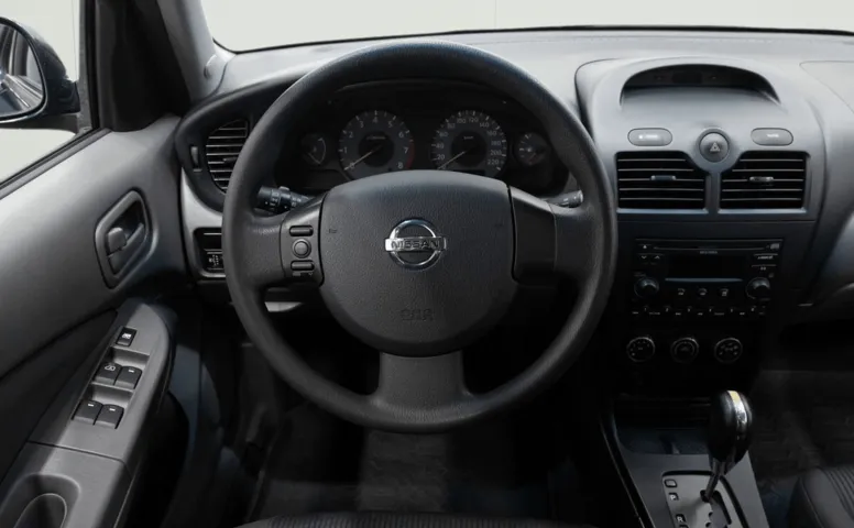 Nissan Almera Classic I 1.6 AT (107 л.с.)